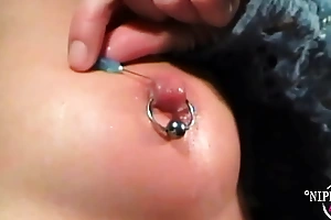 nippleringlover kinky milf jostle needle in eroded nipple after fretting ice on nipples